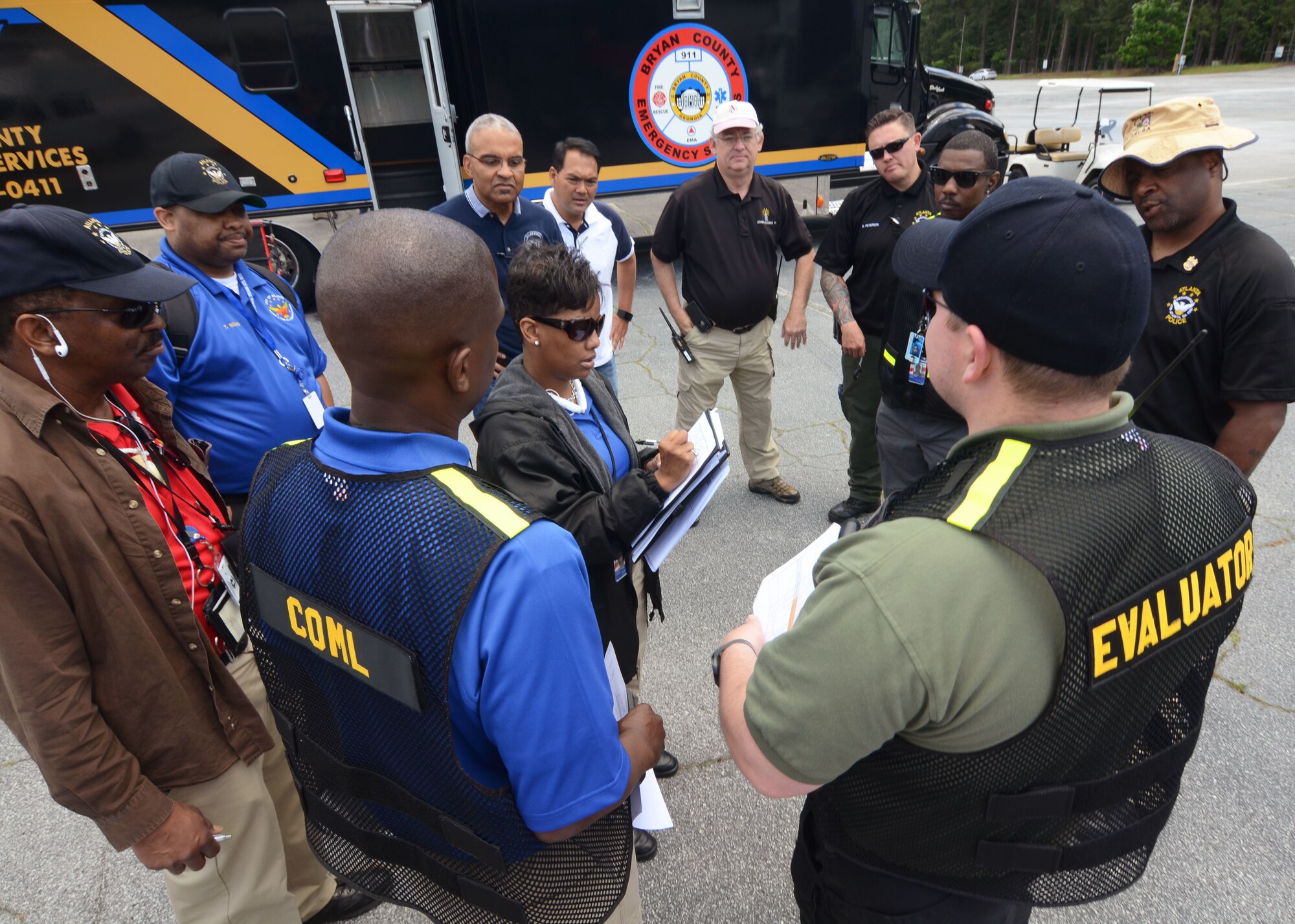 Mobile Communication Vehicle Exercise Team 3 members, assemble to review exercise input during the 2016 Statewide Mobile Communication Vehicle (MCV) Functional Field Exercise (FFX) held at Stone Mountain State Park in Stone Mountain, GA. May 2-6, 2016. The exercise presents a series of catastrophe type scenarios testing critical communication and coordination between MCV emergency response agencies from around the State of Georgia. (U.S. Air Force photo/Don Peek)