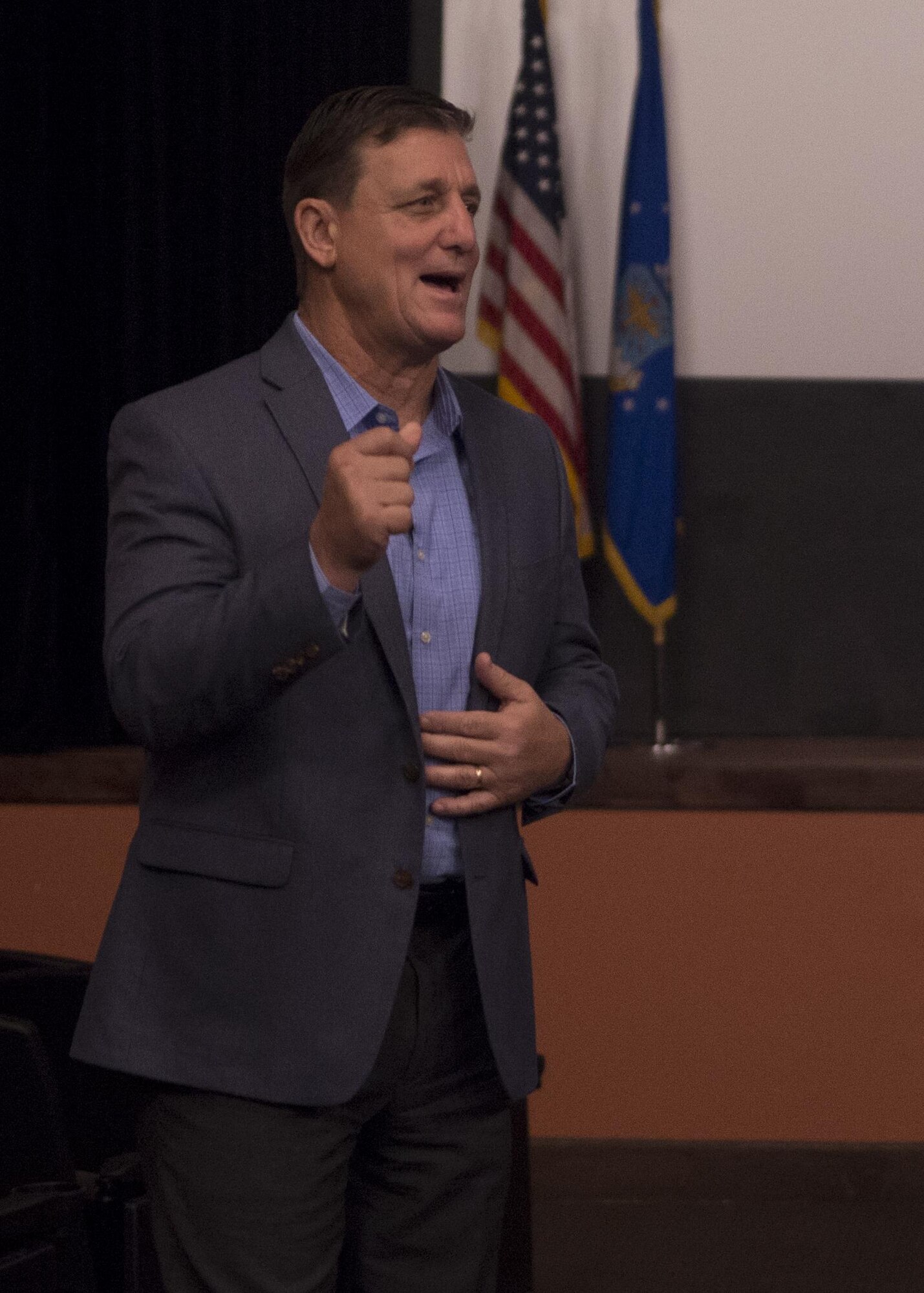 Jeffrey Smith, PACE senior executive advisor, speaks during one of several seminars on Enhancing Human Capital, presented by the Profession of Arms Center of Excellence, May 3, 2016, in the F.E. Warren Air Force Base, Wyo., theater. Along with the normal seminar, base leadership was offered a more tailored version called Professionalism: Leadership Based DNA. (U.S. Air Force photo by Airman 1st Class Malcolm Mayfield)