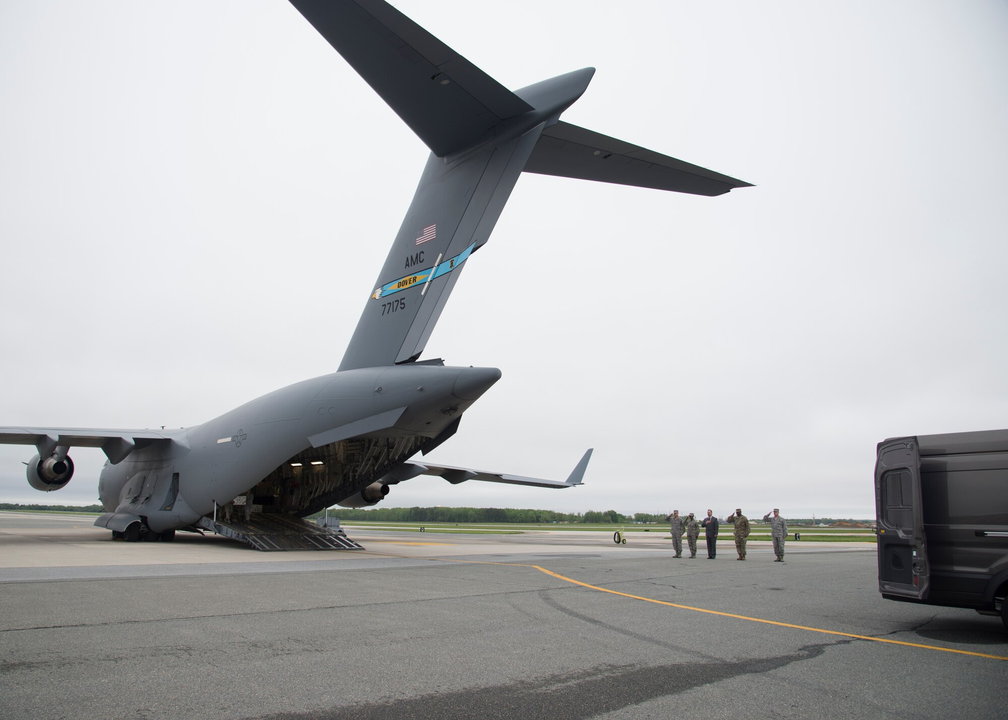 The official party salutes at the Folded Flag 2016 mass fatality dignified transfer exercise May 4, 2016, at Dover Air Force Base, Del. This exercise tested the Air Force Mortuary Affairs Operations and Dover AFB’s capabilities in the event mass fatalities are processed through Dover. (U.S. Air Force photo/Senior Airman Zachary Cacicia)