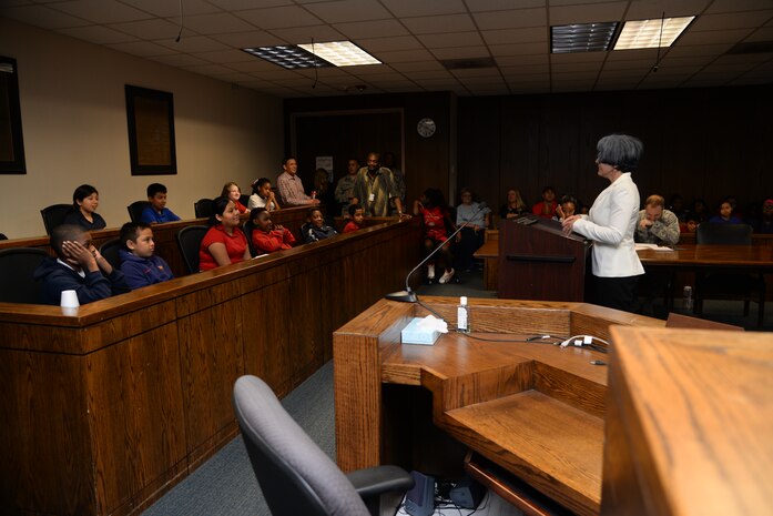 After deliberating, jury members from Lambs Elementary school unanimously agree that Cruella Deville is guilty during the mock court martial May 3, 2016, at Joint Base Charleston, S.C. Fifth grade students from Lambs Elementary acted as jurors, lawyers and bailiff during the mock trial. This was the second year that the JB Charleston legal team opened their courtroom doors for students to learn the military legal process in celebration of Law Day.