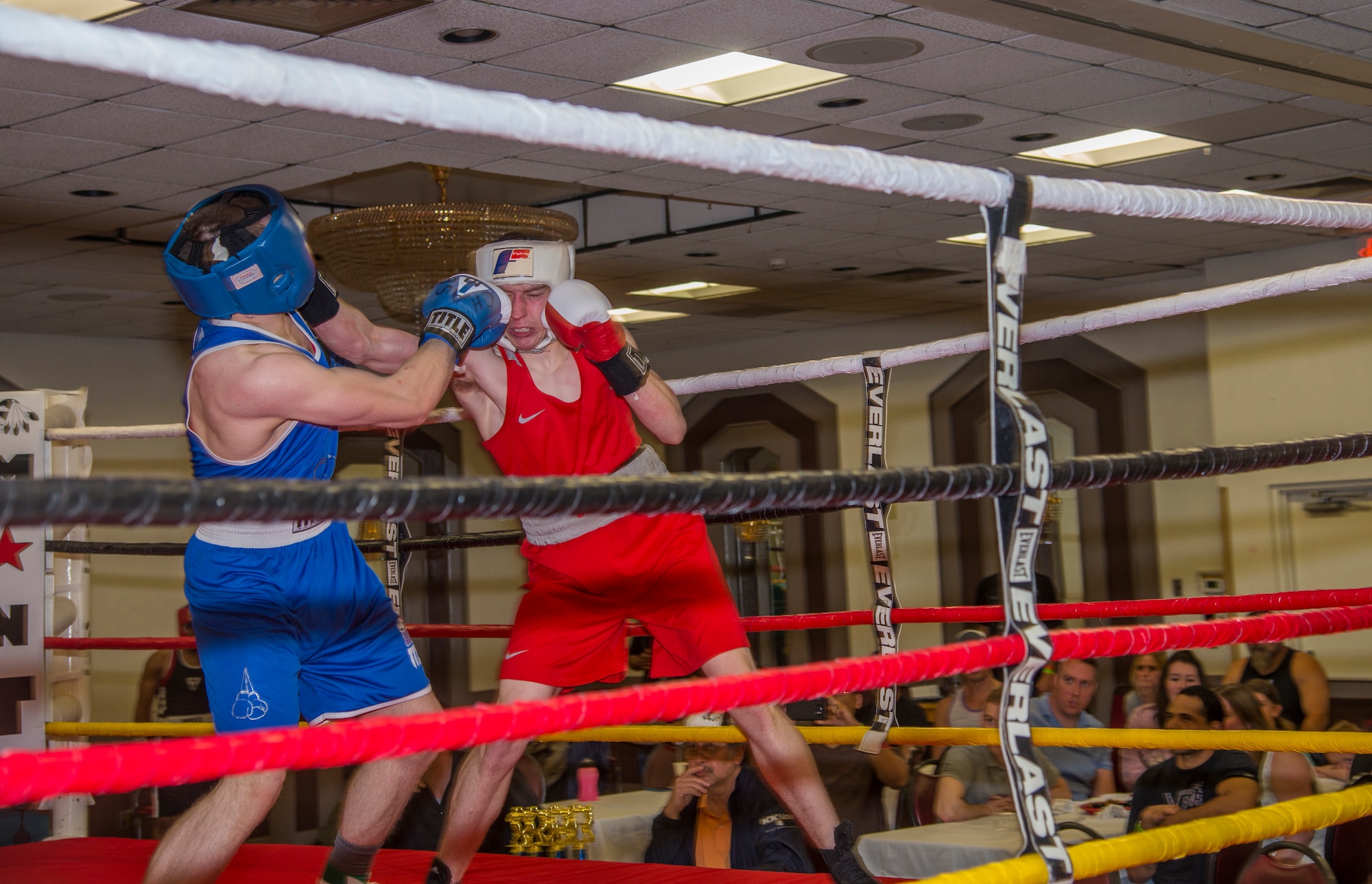 Staff Sgt. Ryan Savage, 91st Security Forces Group evaluator, lands a punch on his opponent during a match in Minot, N.D., May 7, 2016. Savage is a current state and regional champion and will compete for national champion in the 152 weight class soon. (U.S. Air Force photo/Airman 1st Class Christian Sullivan)
