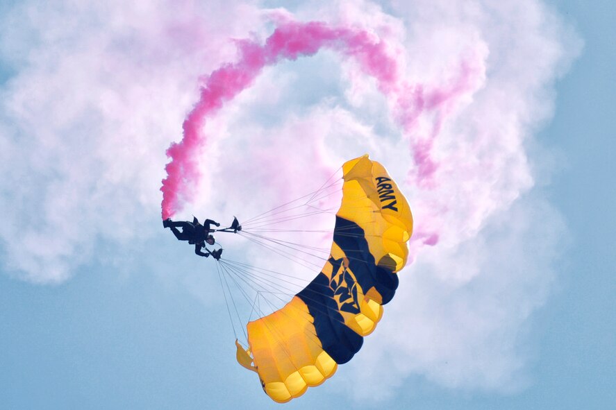 A member of the U.S. Army Golden Knights parachutes towards the ground during the 2016 Friendship Day at Marine Corps Air Station Iwakuni, Japan, May 5, 2016. The Golden Knights is a demonstration and competition parachute team who travel throughout the United States and overseas locations. (U.S. Air Force photo by Senior Airman David Owsianka/Released)