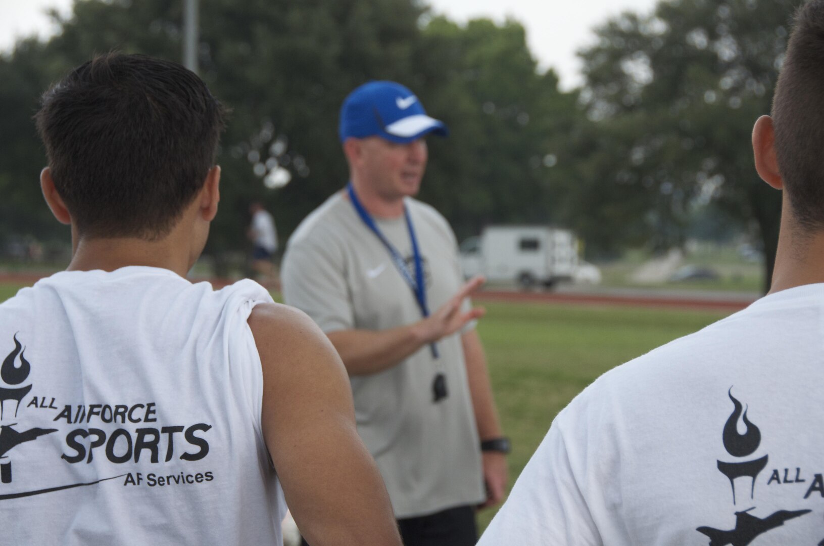 All-Air Force men's soccer coach Lt. Col. Derrick Weyand talks to players during a practice session April 29 at Joint Base San Antonio-Lackland, Texas. The team closed out training camp with a 12-4 record. (U.S. Air Force photo/Steve Warns/Released) 