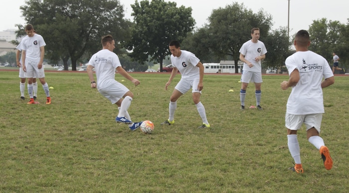 The All-Air Force men's soccer team practices April 29 at Joint Base San Antonio-Lackland, Texas. The team trained three times a day during the 2 1/2-week training camp. (U.S. Air Force photo/Steve Warns/Released)