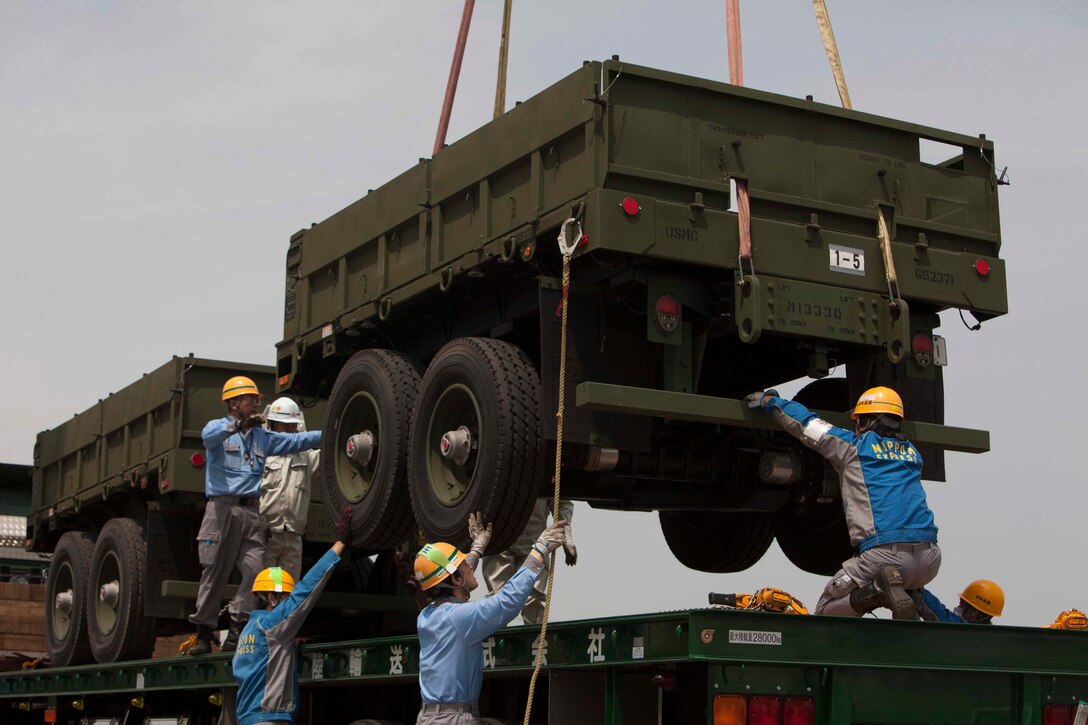 SENDAI, Japan – Japanese embarkation contractors unload cargo for Artillery Relocation Training Program 16-1 on May 9, 2016. ARTP is a Japan-funded, routine training exercise that allows Marines with 3rd Battalion, 12th Marine Regiment, 3rd Marine Division, III Marine Expeditionary Force based out of Camp Hansen, Okinawa, Japan, to conduct live-fire training.