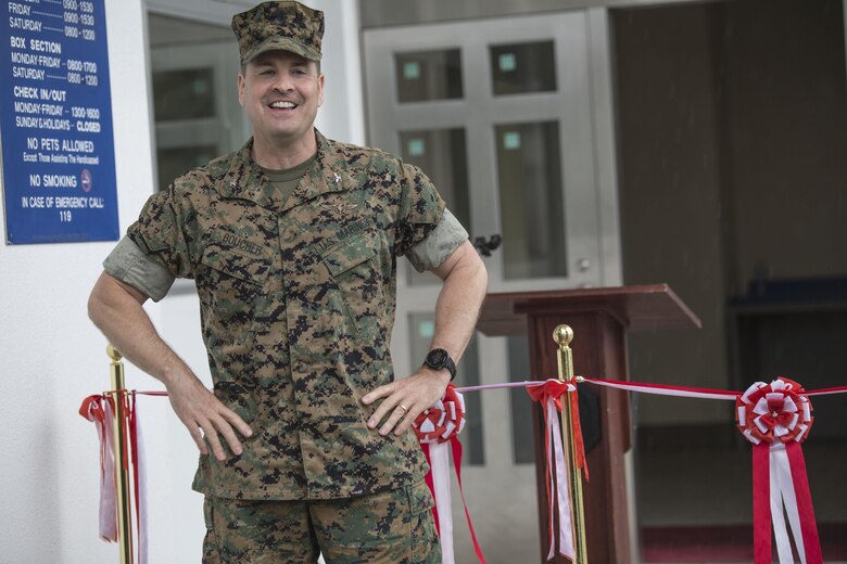 Col. Robert V. Boucher, commanding officer of Marine Corps Air Station Iwakuni, gives his opening remarks during  the grand opening ceremony for the new south side post office May 9, 2016. The new post office will start delivering and sending mail on opening day. (U.S. Marine Corps photo by Cpl. Nathan Wicks/Released) 