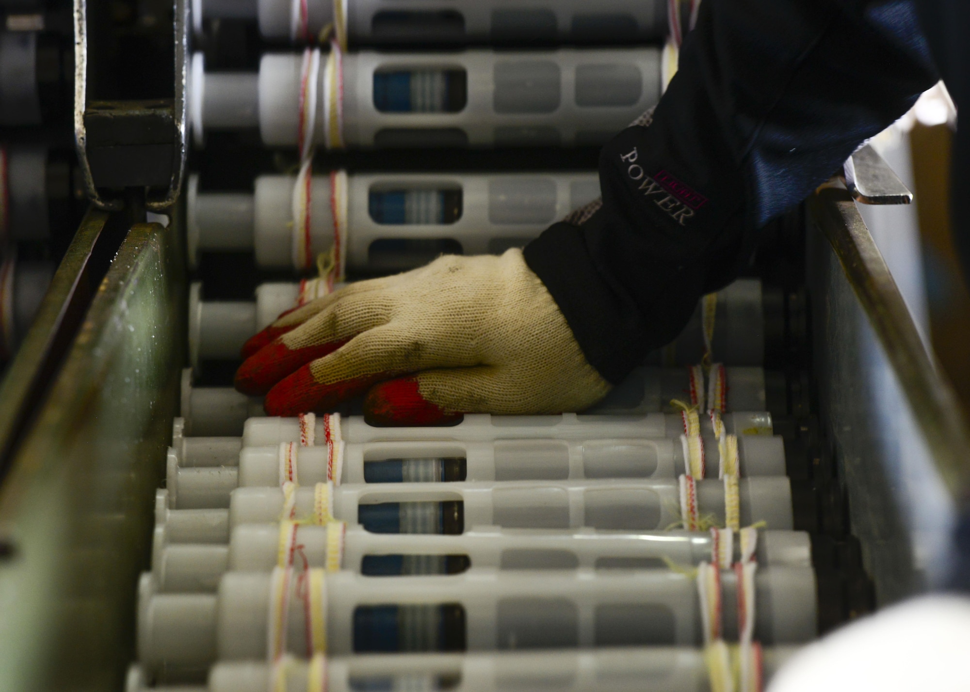 A 51st Munitions Squadron conventional maintenance crew member prepares 30 mm ammunition for inventory during Exercise Beverly Herd 16-01, May 9, 2016, at Osan Air Base, Republic of Korea. The 51st MUNS provides superior armament systems and quality munitions wherever and whenever needed. (U.S. Air Force photo by Senior Airman Victor J. Caputo/Released)