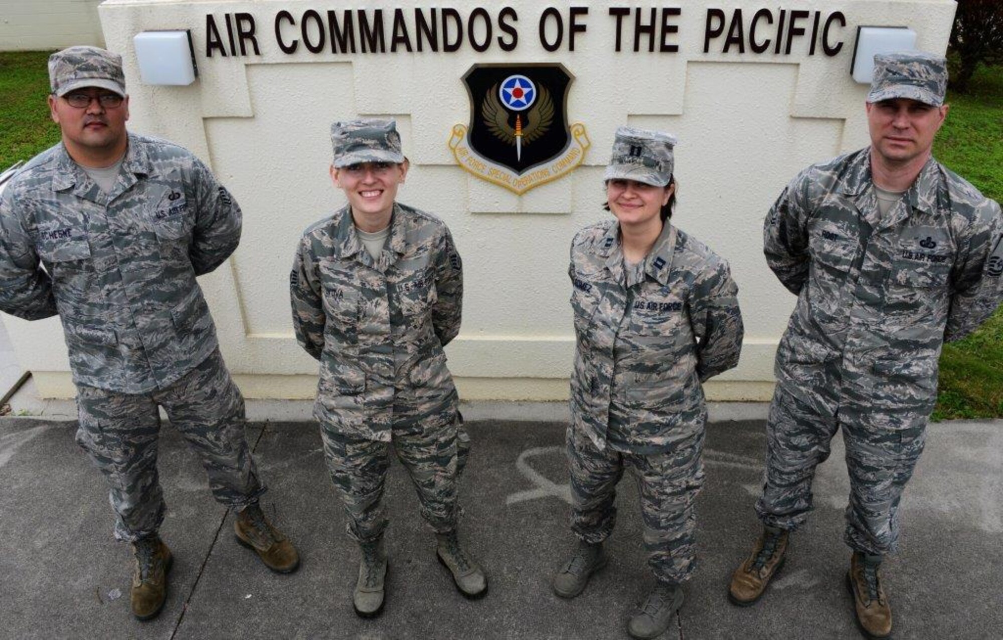 From left, Master Sgt. Michael Duchesne, Staff Sgt. Inna Lvova, Capt. Vanessa Gomez and Master Sgt. Jason Post, all members of the 2015 353rd Special Operations Group Financial Management flight from Kadena Air Base, Japan, who were recently named the Under Secretary of Defense Comptroller 2015 Financial Management Award recipients for contribution in budget formulation and execution below major command level. (U.S. Air Force photo by Master Sgt. Kristine Dreyer)