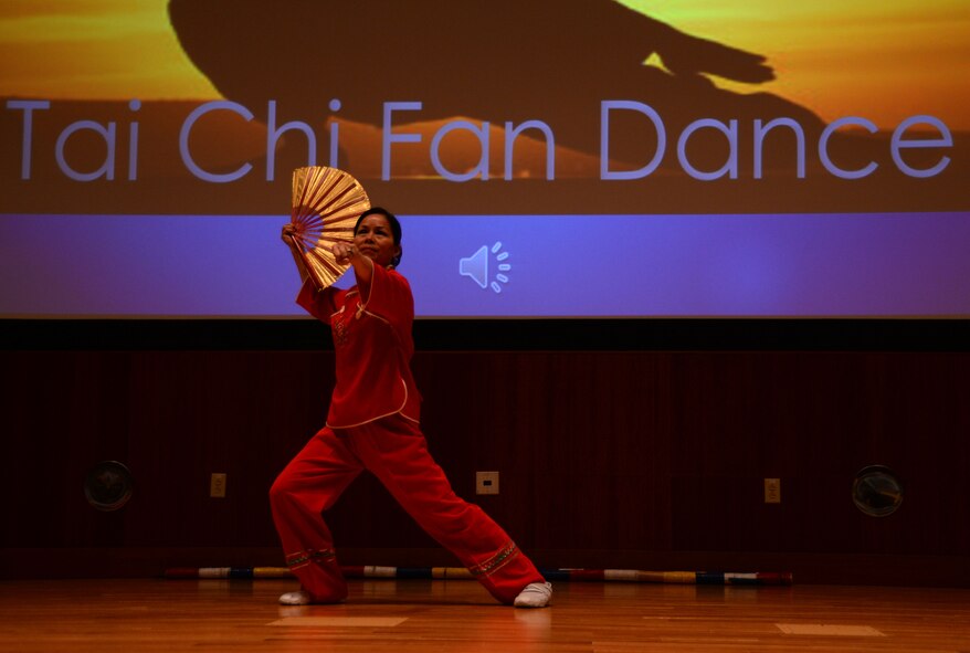 A member of the Dayton Association of Chinese Americans preforms a Tai Chi fan dance during an Asian American and Pacific Islander Month celebration at the National Air and Space Intelligence Center on Wright-Patterson Air Force Base, Ohio, May 6, 2016. Approximately 10 million U.S. citizens are Asian-Pacific Americans; of those nearly 300,000 are veterans.  (U.S. Air Force photo/Master Sgt. Tammie Moore)  