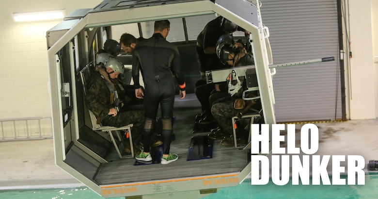 Marines with Marine Medium Tiltrotor Squadron 264 prepare to plunge into the water during survival training at Camp Lejeune, Apr. 28, 2016. The Marines used a simulated helicopter body while training for different underwater escape scenarios as qualification to be attached to a Marine Expeditionary Unit.  (U.S. Marine Corps photo by Lance Cpl. Aaron K. Fiala/Released)