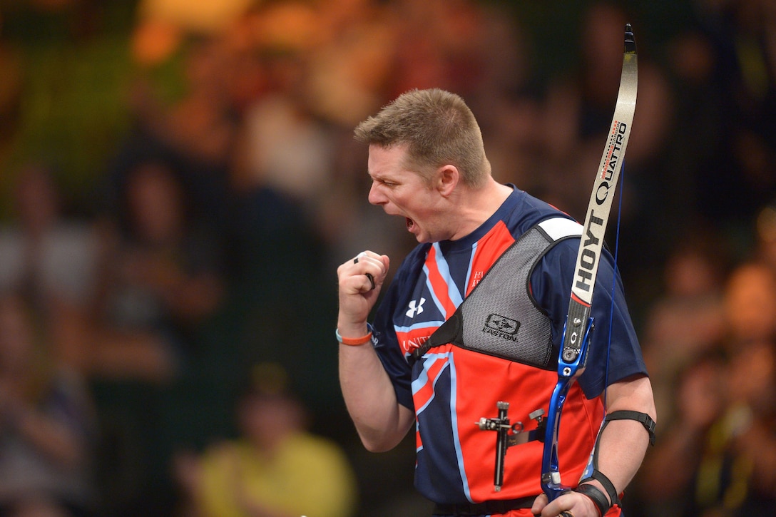 Great Britain’s Gareth Paterson reacts after winning his match in the archery finals during the 2016 Invictus Games in Orlando, Fla., May 9, 2016. Army photo by Staff Sgt. Alex Manne