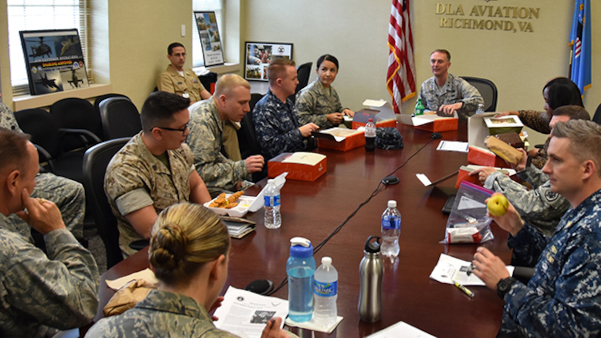 Air Force Maj. Gen. Warren Berry, vice commander, Air Force Materiel Command, Wright-Patterson Air Force Base, Ohio, shares lunch with Defense Logistics Agency Aviation's military cadre during his visit to Defense Supply Center Richmond, Virginia, May 4, 2016.