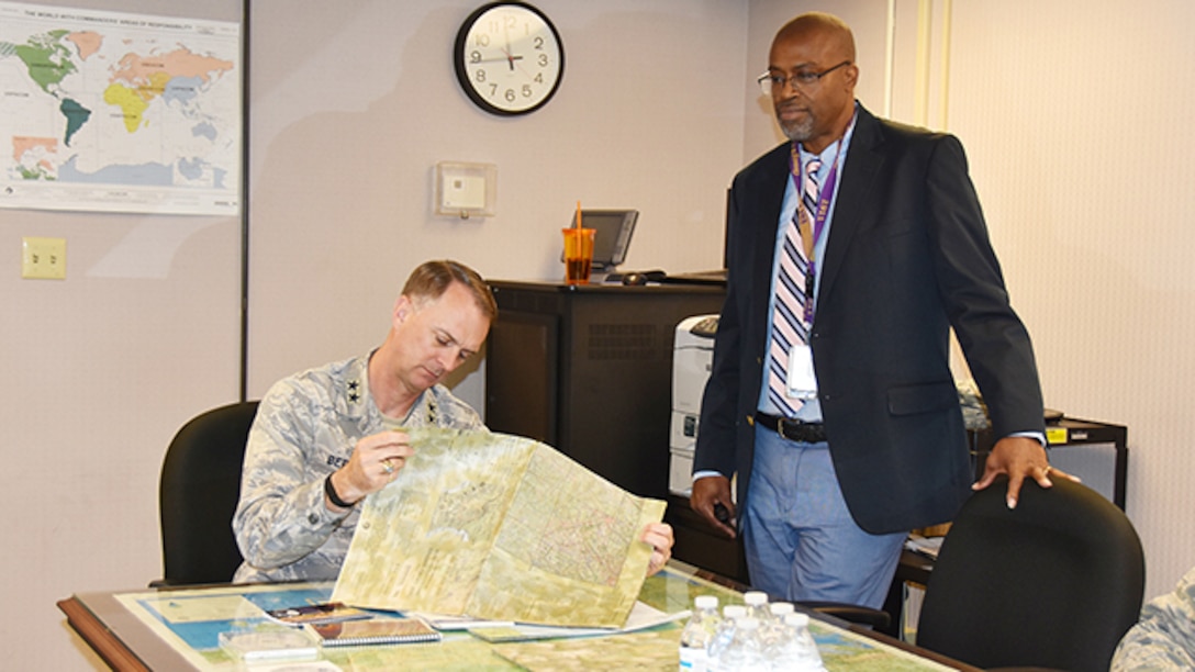 Air Force Maj. Gen. Warren Berry, vice commander, Air Force Materiel Command, Wright-Patterson Air Force Base, Ohio, stopped into Defense Logistics Agency Aviation Customer Operation’s Mapping Division to learn about their mission when he visited DLA Aviation May 4, 2016 on Defense Supply Center Richmond, Virginia. 