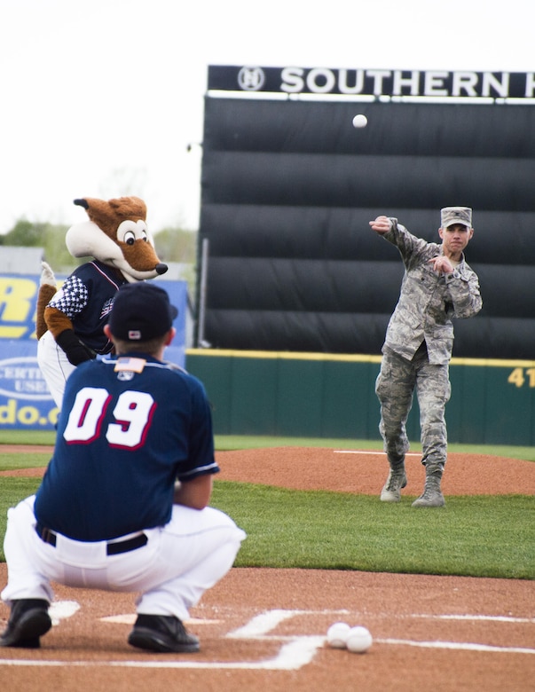 Col. Stephen Slade, Individual Mobilization Augmentee to the 50th Space Wing commander, throws the ceremonial first pitch prior to the game between Colorado Springs Sky Sox and Oklahoma City Dodgers at Security Service Field in Colorado Springs, Colorado, Friday, May 6, 2016. The game was part of the Sky Sox Air Force Appreciation Night to honor the Airmen stationed in Colorado Springs. (U.S. Air Force photo/Tech. Sgt. Julius Delos Reyes)