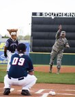 Col. Gary Cornn, 721st Mission Support Group commander, at Cheyenne Mountain Air Force Station, Colorado, throws the ceremonial first pitch prior to the game between Colorado Springs Sky Sox and Oklahoma City Dodgers at Security Service Field in Colorado Springs, Colorado, Friday, May 6, 2016. During the event, 1st Lt. Fanita Schmidt, 4th Space Operations Squadron, sang the national anthem, while the High Frontier Honor Guard presented the colors. (U.S. Air Force photo/Tech. Sgt. Julius Delos Reyes)