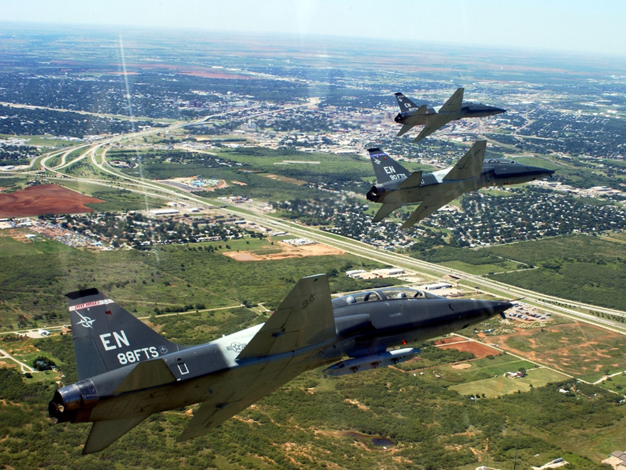 Euro-NATO Joint Jet Pilot Training student pilots fly in formation in the T-38 at Sheppard Air Force Base, Texas. As part of their training, ENJJPT student pilots learn various skills and maneuvers in both the T-6 and T-38 aircrafts, as well as in flight simulators. (U.S. Air Force photo/82nd Training Wing Public Affairs)