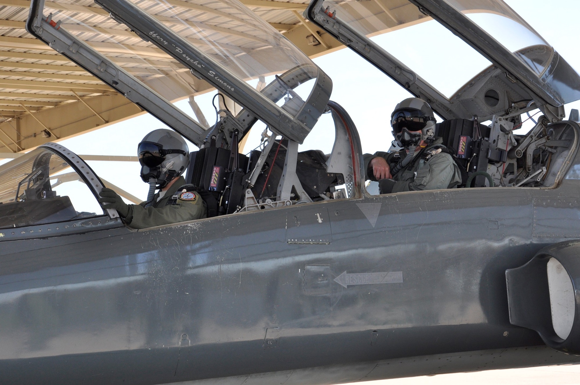 A Euro-NATO Joint Jet Pilot Training student pilot and instructor pilo9t check the T-38 aircraft systems and functions before taking off at Sheppard Air Force Base, Texas. Before and after flights, pilots and maintainers must check the entire aircraft to ensure that it is fully functional and safe for flight. The ability to know and perform this task is one of the many requirements ENJJPT student pilots must do to complete the program. (U.S. Air Force photo/82nd Training Wing Public Affairs)