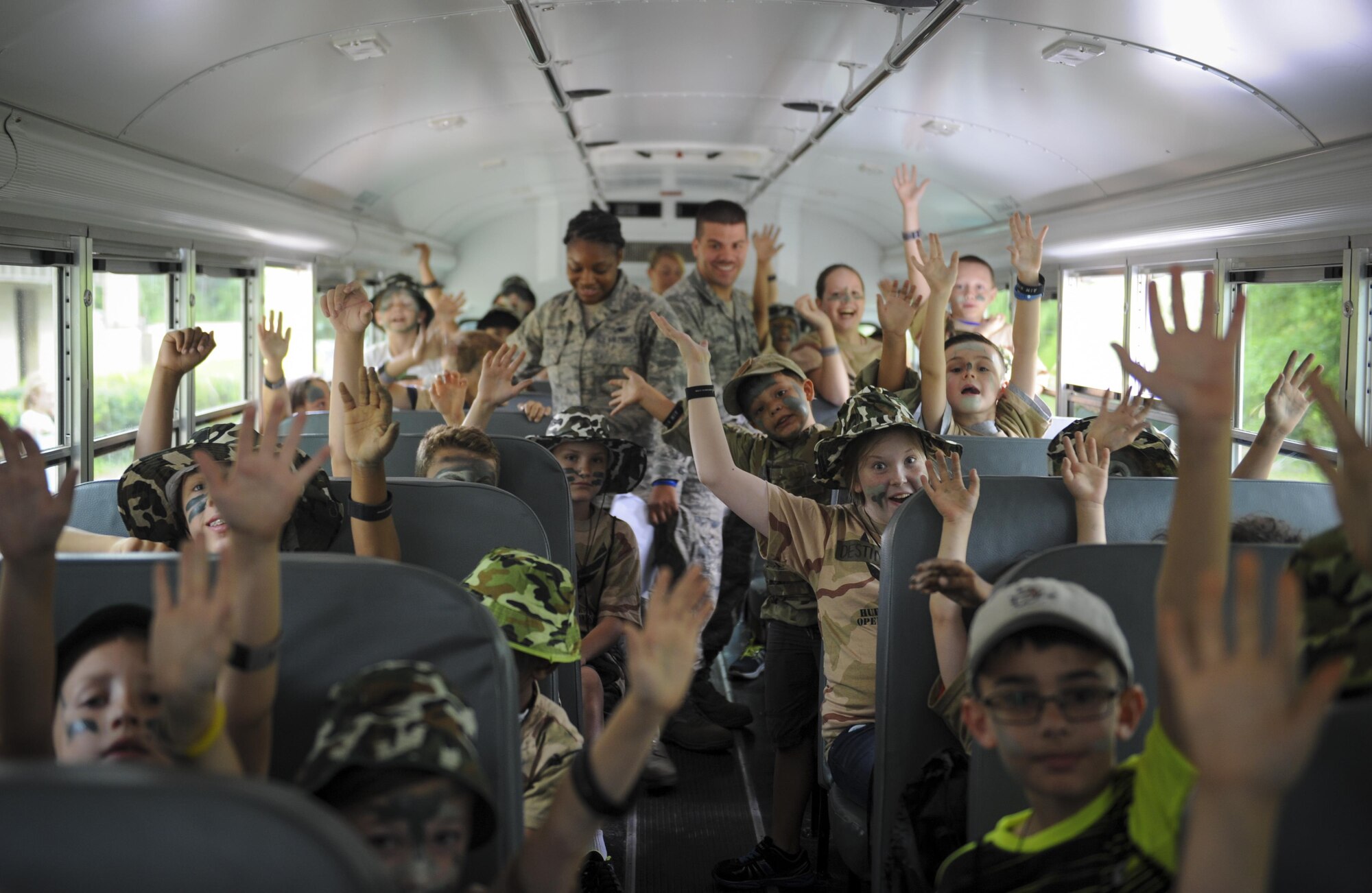 Children get ready to go to their “deployment zone” during Operation Kids Understanding Deployment Operations at Hurlburt Field, Fla., April 30, 2016. Operation KUDOS is an educational event aimed to help build resiliency in military youth by engaging them in activities that simulate the pre-deployment experience, such as pre-deployment lines and demonstrations and games held by multiple squadrons around Hurlburt. The event concluded with a “homecoming” where parents welcomed back their children. (U.S. Air Force photo by Senior Airman Meagan Schutter)