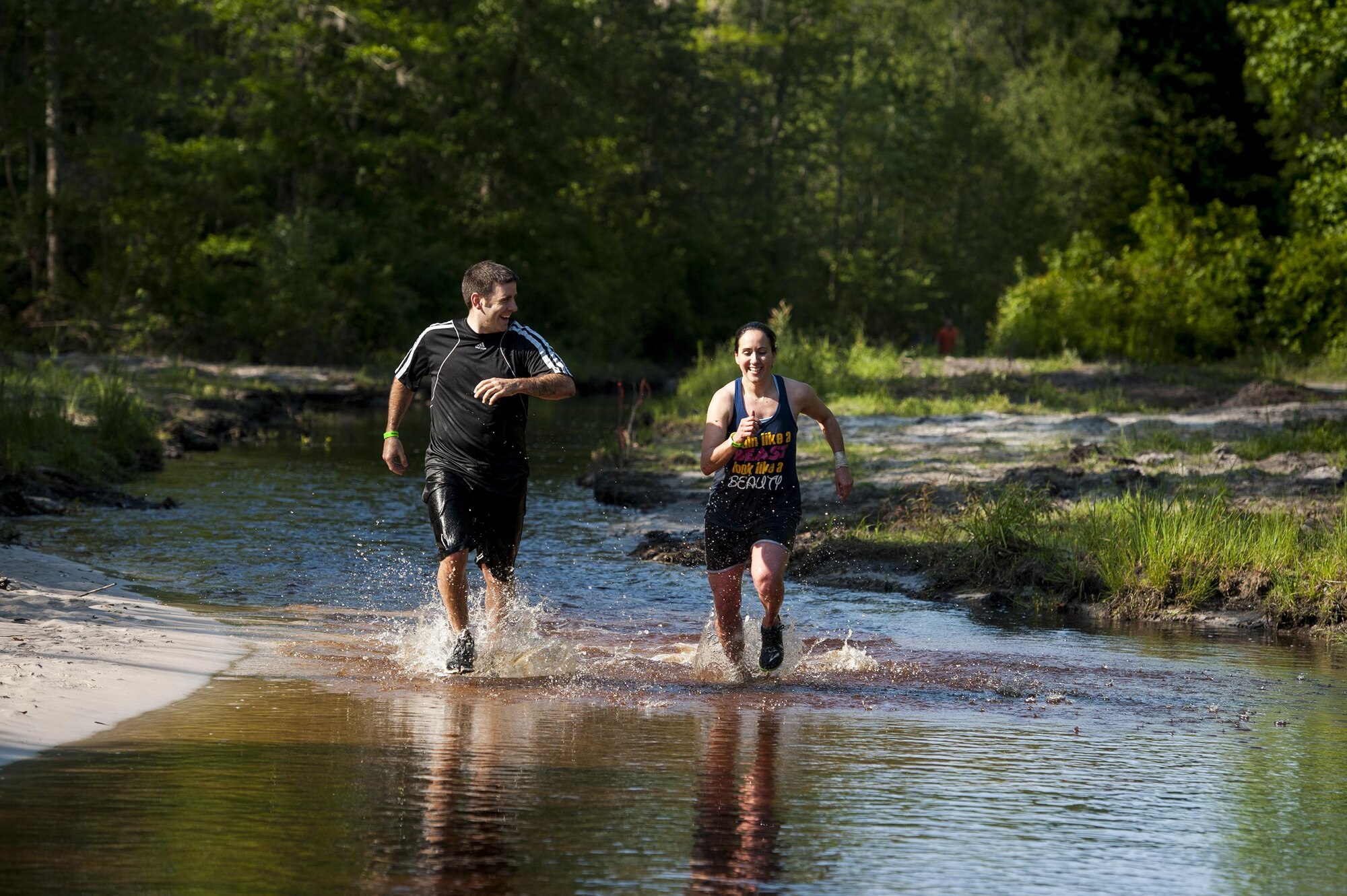Contenders run during the 2016 Moody Mudder, May 7, 2016, in Ray City, Ga. Runners were encouraged to dress up in costumes for this year’s theme of “challenge the elements.” (U.S. Air Force photo by Airman 1st Class Lauren M. Hunter/Released)