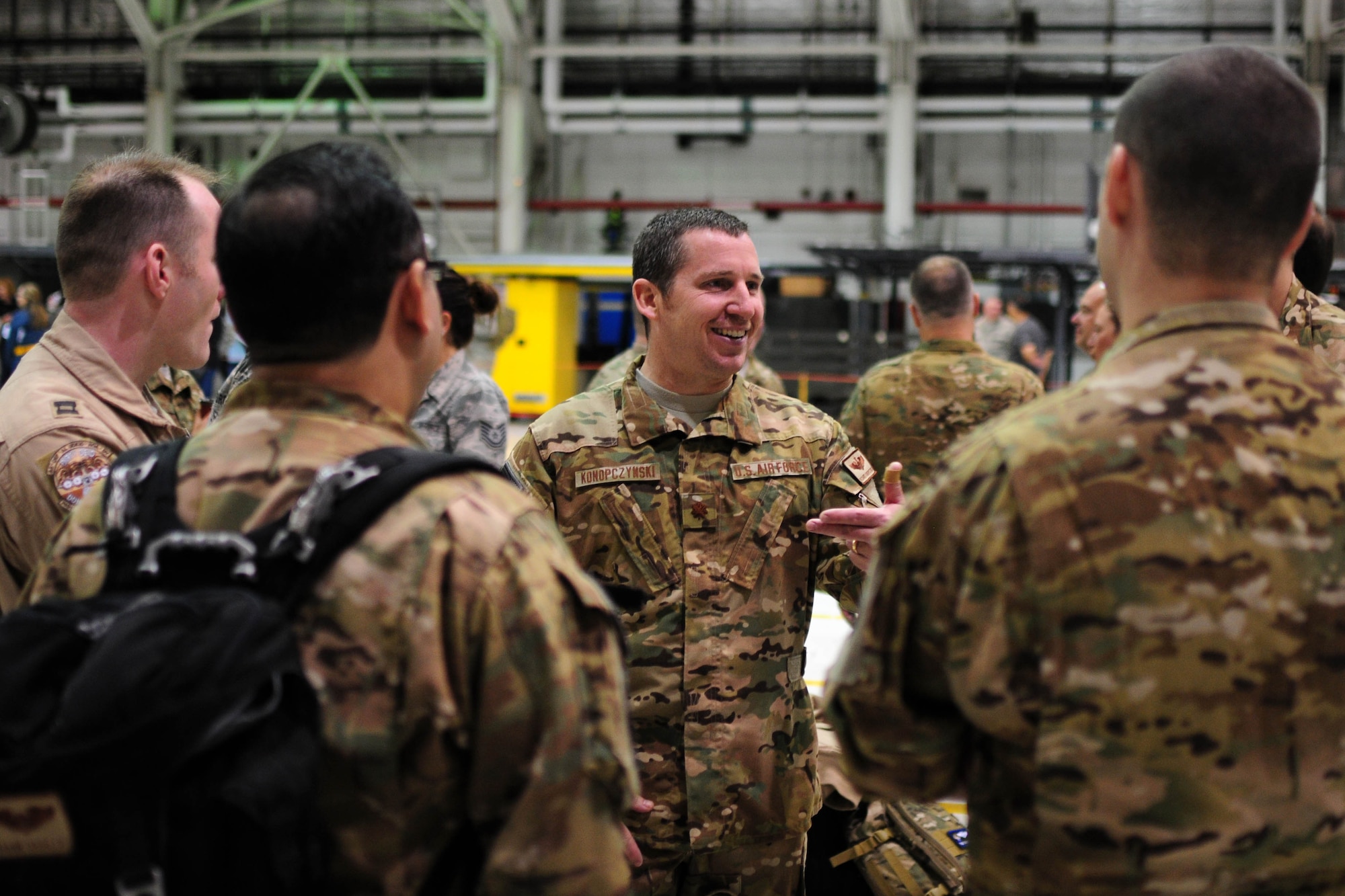 Members of the 914th Airlift Wing share a moment at Niagara Falls Air Reserve Station prior to deployment on May 7, 2016. The deployment will take these Airmen to Quatar in support of Operation Inherent Resolve. (U.S. Air Force photo by Staff Sgt. Richard D. Mekkri/released)