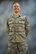 Senior Airman Chadwick McIntosh, 910th Inspector General inspections team member, poses for a photo in the photo studio here, March 6, 2016. McIntosh committed to a healthier lifestyle and shed 80 pounds in order to pass his Fit to Fight test and rejoin the Air Force Reserve. (U.S. Air Force photo/Tech. Sgt. James Brock)