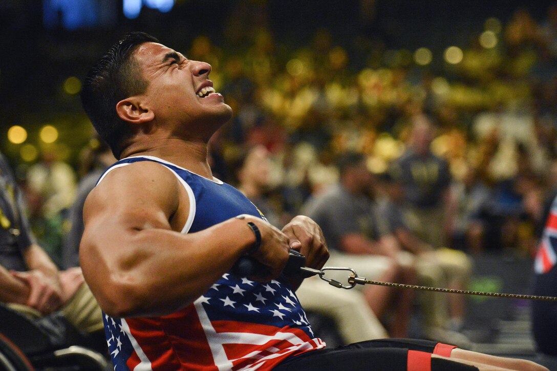 Marine Corps Staff Sgt. Rafael Cervantes competes in a rowing event during the 2016 Invictus Games in Orlando, Fla., May 9, 2016. Air Force photo by Tech. Sgt. Joshua L. DeMotts



