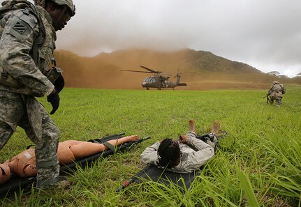 SCHOFIELD BARRACKS, HAWAII (May 4, 2016) - Ministry Soldiers throughout the 25th Infantry Division prepare to medically evacuate a wounded Soldier during the Best Unit Ministry Team Competition on Schofield Barracks May 4. The competition tested basic Soldier skills and ministry specific skill sets from movement under fire to memorial ceremony preparation for a fallen Soldier. 