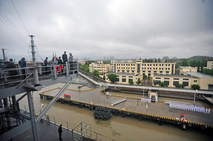 SHANGHAI (May 10, 2016) - Commanding Officer of the U.S. 7th Fleet flagship USS Blue Ridge (LCC 19), Capt. Matt Paradise, looks on from the starboard bridge wing as the ship departs Shanghai. Blue Ridge is currently on patrol in the 7th Fleet area of operations strengthening and fostering relationships in the Indo-Asia-Pacific region. 
