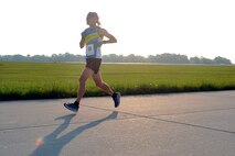Craig Christians, from Bellevue, Neb., keeps pace while running on the flightline for the eighth annual Bellevue-Offutt Runway Run at Offutt Air Force Base, Neb., May 8, 2016. Craig placed first in the 50-59 year old age division and is the coach for the Bellevue West High School Cross Country team. More than 100 runners participated in the 2016 Bellevue – Offutt Runway Run for the 2016 event. (U.S. Air Force photo by Jeff Gates)