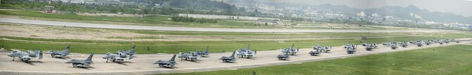 A-10 Thunderbolt II and F-16 Fighting Falcon fighter aircraft perform an 'Elephant Walk' on the runway this week during Exercise Beverly Herd 16-01 at Osan Air Base, Republic of Korea. The Elephant Walk was a demonstration of U.S. Air Force capabilities and strength and showcases the wing's ability to generate combat airpower in an expedient manner in order to respond to simulated contingency operations. The A-10 Thunderbolt II aircraft are the 25th Fighter Squadron "Draggins" and the F-16 Fighting Falcon aircraft are the 36th Fighter Squadron "Friends" from the 51st Fighter Wing, Osan AB, ROK; the additional F-16 aircraft are the 179th Fighter Squadron "Bulldogs" from the 148th Fighter Wing out of Duluth Air National Guard Base, Minnesota. .(U.S. Air Force photo by Staff Sgt. Jonathan Steffen/Released)
