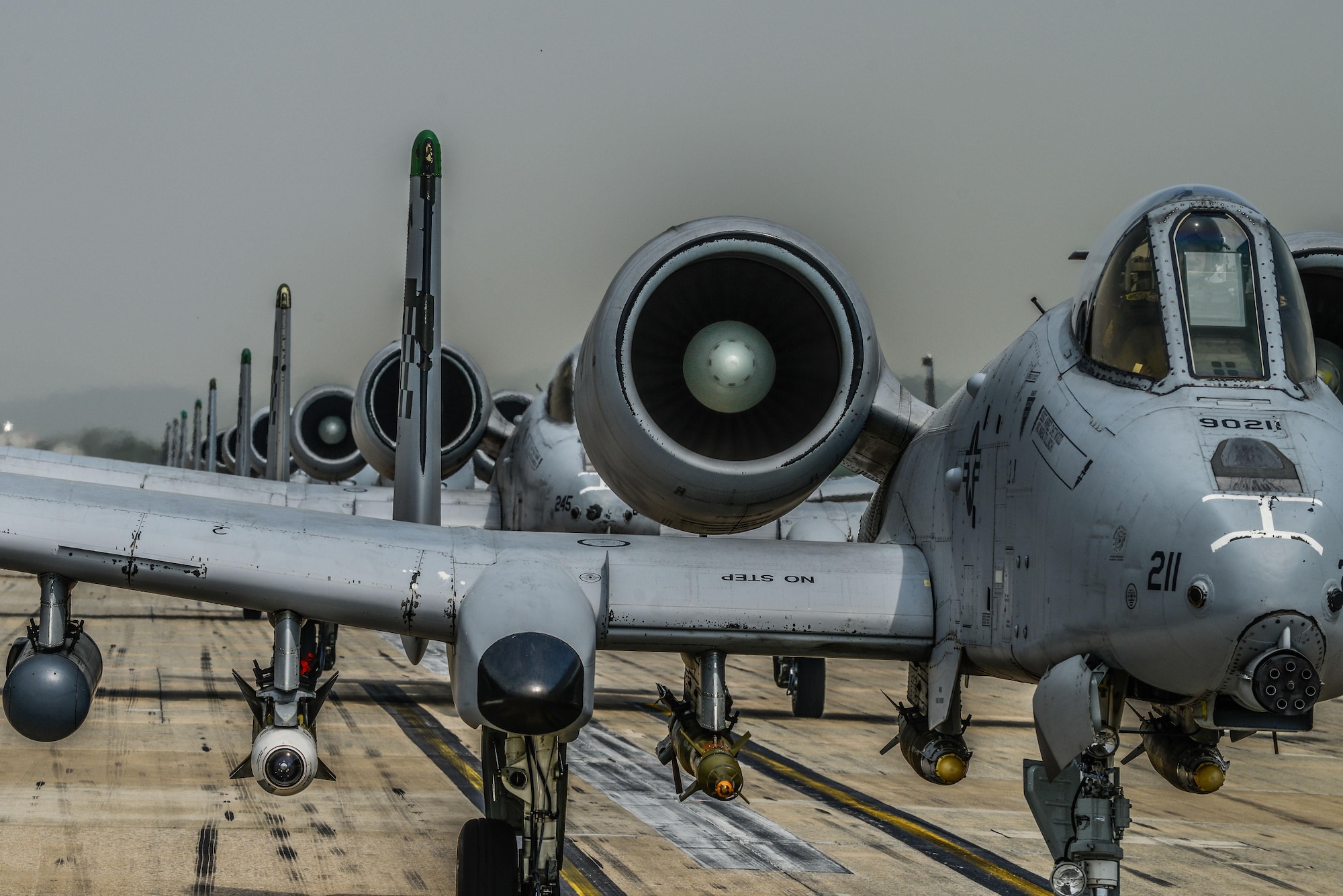 A-10 Thunderbolt II and F-16 Fighting Falcon fighter aircraft perform an 'Elephant Walk' on the runway this week during Exercise Beverly Herd 16-01 at Osan Air Base, Republic of Korea. The Elephant Walk was a demonstration of U.S. Air Force capabilities and strength and showcases the wing's ability to generate combat airpower in an expedient manner in order to respond to simulated contingency operations. The A-10 Thunderbolt II aircraft are the 25th Fighter Squadron "Draggins" and the F-16 Fighting Falcon aircraft are the 36th Fighter Squadron "Friends" from the 51st Fighter Wing, Osan AB, ROK; the additional F-16 aircraft are the 179th Fighter Squadron "Bulldogs" from the 148th Fighter Wing out of Duluth Air National Guard Base, Minnesota. (U.S. Air Force photo by Senior Airman Dillian Bamman/Released)