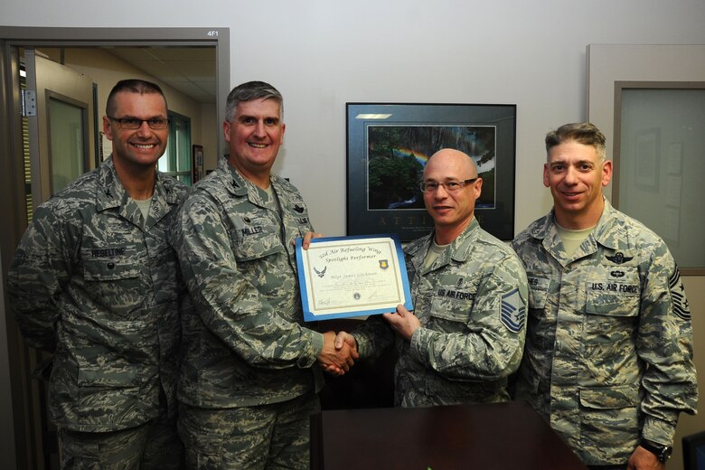 Master Sgt. James Glickman, 22nd Medical Group executive, poses with Col. Albert Miller, 22nd Air Refueling Wing commander, May 3, 2016, at McConnell Air Force Base, Kan. Glickman received the spotlight performer for the week of April 11-15. (U.S. Air Force photo/Airman 1st Class Christopher Thornbury)