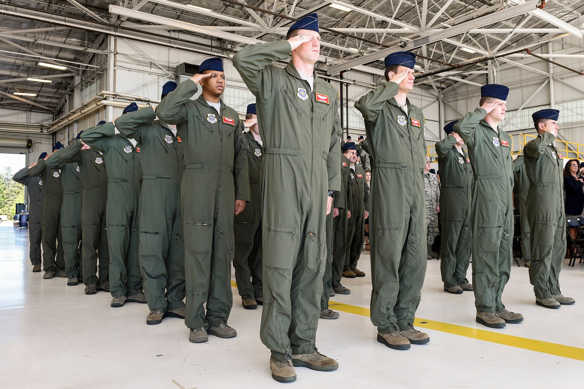 Members of the 10th Airlift Squadron render a final salute to their commander, Lt. Col. Nathan Campbell (not pictured), during the 10th AS inactivation ceremony May 6, 2016, at Joint Base Lewis McChord, Wash. The 10th AS was inactivated as a provision of the 2015 President’s Budget. (U.S. Air Force photo/Tech. Sgt. Sean Tobin)