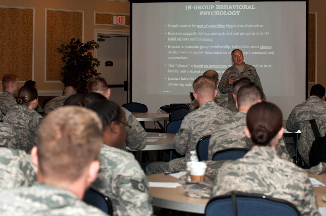 U.S. Air Force Col. Joseph Rizzuto, director of the Profession of Arms Center of Excellence course, spoke to Airmen with the 30th Intelligence Squadron about becoming leaders at Langley Air Force Base, Va., May 3, 2016. Rizzuto led the Airmen through discussion-based scenarios, reflective questions and real-life stories during the all-day event. (U.S. Air Force photo by Airman 1st Class Kaylee Dubois)