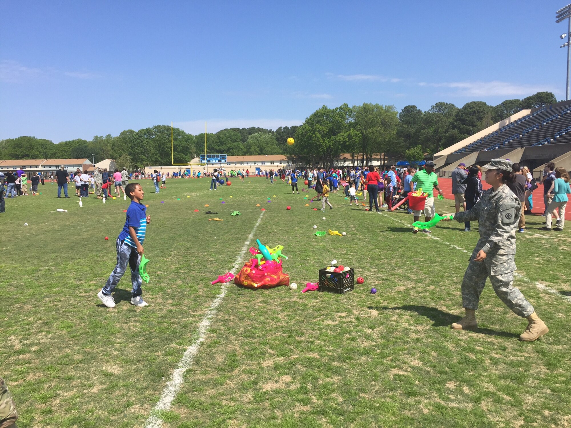 U.S. Army Soldiers from the 689th Rapid Port Opening Element volunteer at the 45th Annual George Green Field Day at Todd Stadium in Newport News, Virginia, April 25, 2015.  The annual field day is an opportunity for special needs children to participate in adaptive field sports with the help of volunteers from the local community. (U.S. Army courtesy photo)
