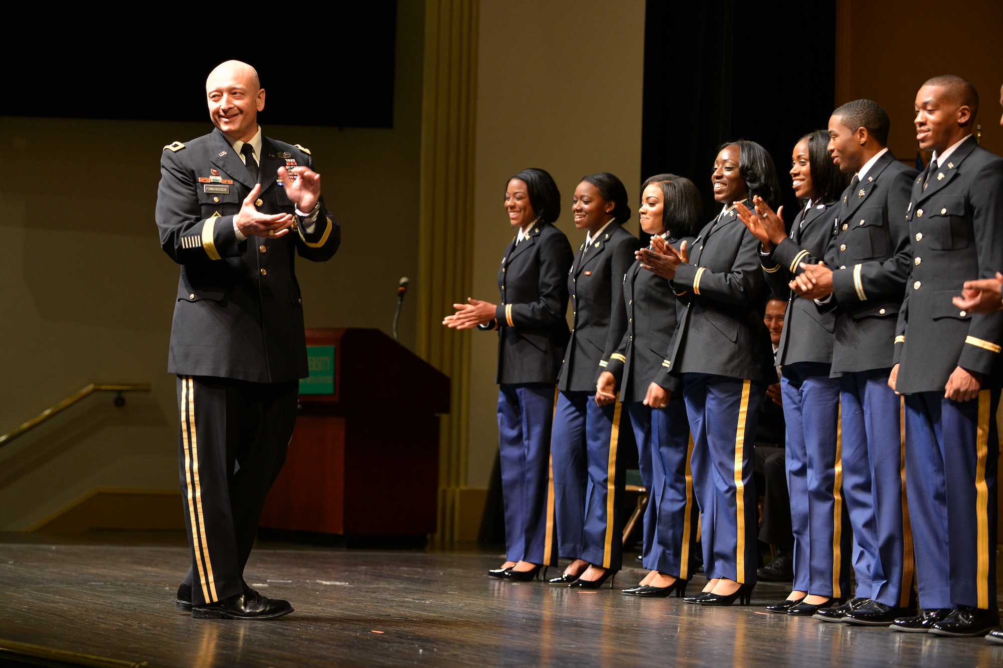 U.S. Army Maj. Gen. Anthony C. Funkhouser, the commander of the Center for Initial Military Training, congratulates newly commissioned Army officers during the Norfolk State University Spring Commissioning Ceremony in Norfolk, Va., May 6, 2016. During the ceremony, Funkhouser spoke of what it means to lead as an officer in today’s Army. (U.S. Air Force photo by Staff Sgt. Natasha Stannard)
