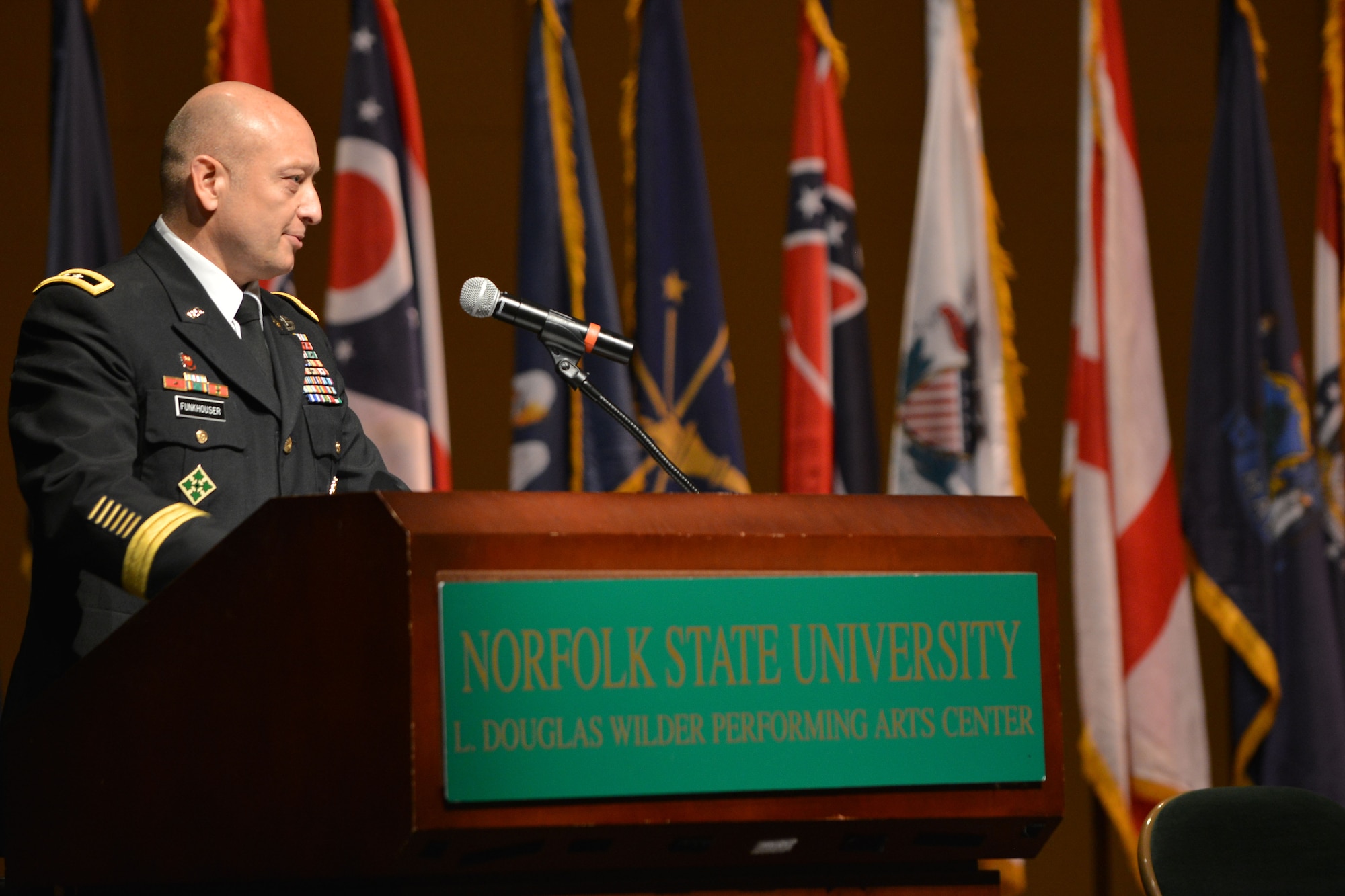 U.S. Army Maj. Gen. Anthony C. Funkhouser, the commander of the Center for Initial Military Training, speaks at the Norfolk State University Spring Commissioning Ceremony in Norfolk, Va., May 6, 2016. Funkhouser was invited as the guest speaker and commissioning officer. (U.S. Air Force photo by Staff Sgt. Natasha Stannard)