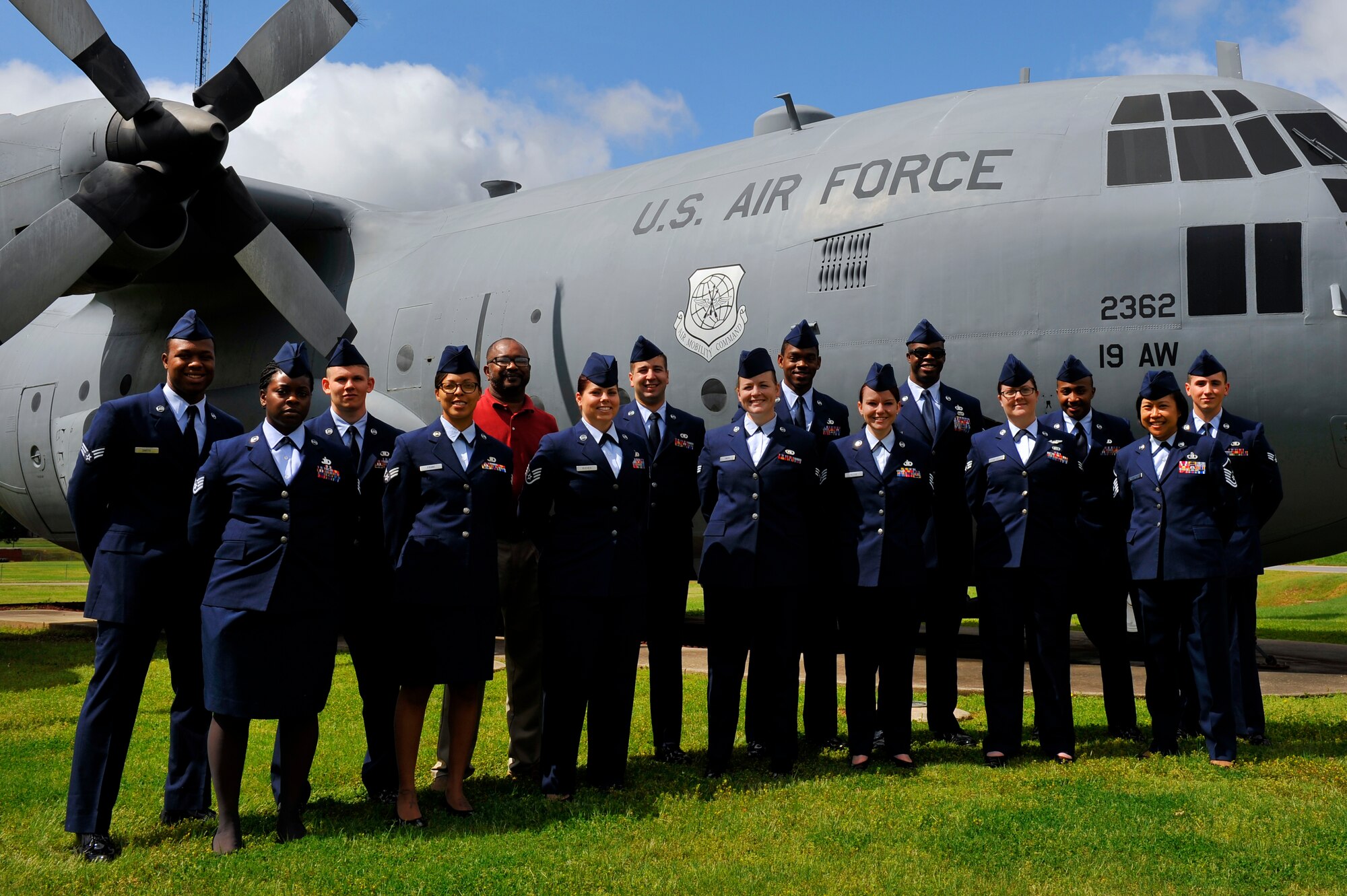 Service members from 19th Operations Group clenched Air Force Aviation Resource Management Annual Sergeant Dee Campbell Large Unit Award, May 2, 2016, at Little Rock Air Force Base, Ark.  The 19th OG certified 1,600 pre-mission checklists, delivered 30,000 passengers and 102,000 tons of cargo in support of command joint special operations air component allies. (U.S. Air Force photo by Airman Kevin E. Sommer Giron)