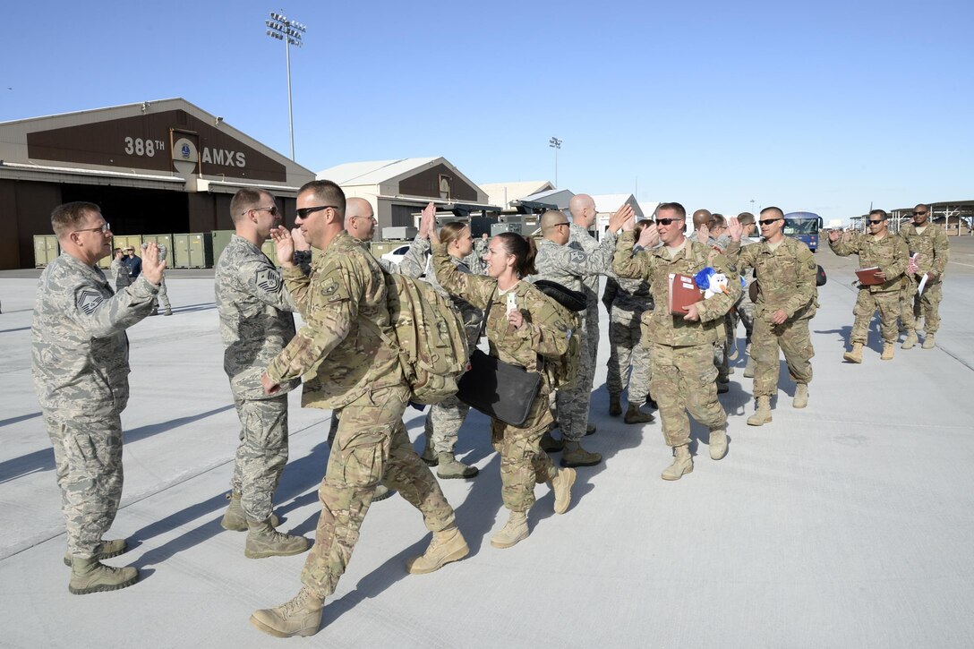 Airmen from the 388th Fighter Wing are welcomed home May 10 at Hill Air Force Base after spending the past eight months deployed in support of Operation Freedom’s Sentinel. As the 388th Fighter Wing transitions to the F-35 Lightning II aircraft, it’s likely this is the final combat operation for Hill’s F-16 Fighting Falcon aircraft after nearly 40 years of providing air superiority for U.S. forces. (U.S. Air Force photo by Todd Cromar)