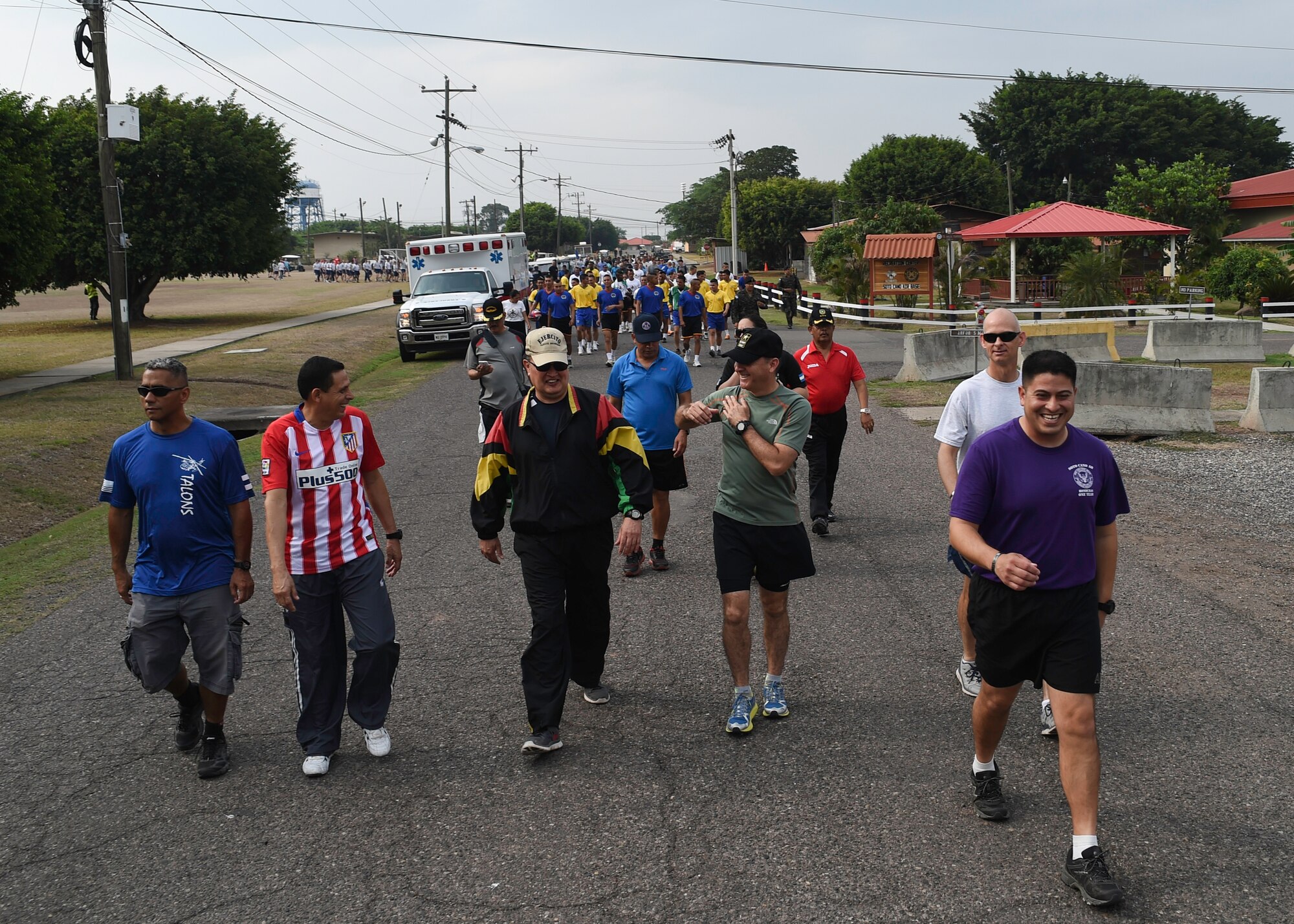 Members of the Honduran and U.S. militaries kick off 2016 Camaraderie Day with a “fun walk” to warm up for the day’s sporting events that included track and field, volleyball, a bike race and soccer, at Soto Cano Air Base, Honduras, May 5, 2016. The day was designed to celebrate the partnership between the armed forces of the U.S. and Honduras through friendly competition. (U.S. Air Force photo by Staff Sgt. Siuta B. Ika)