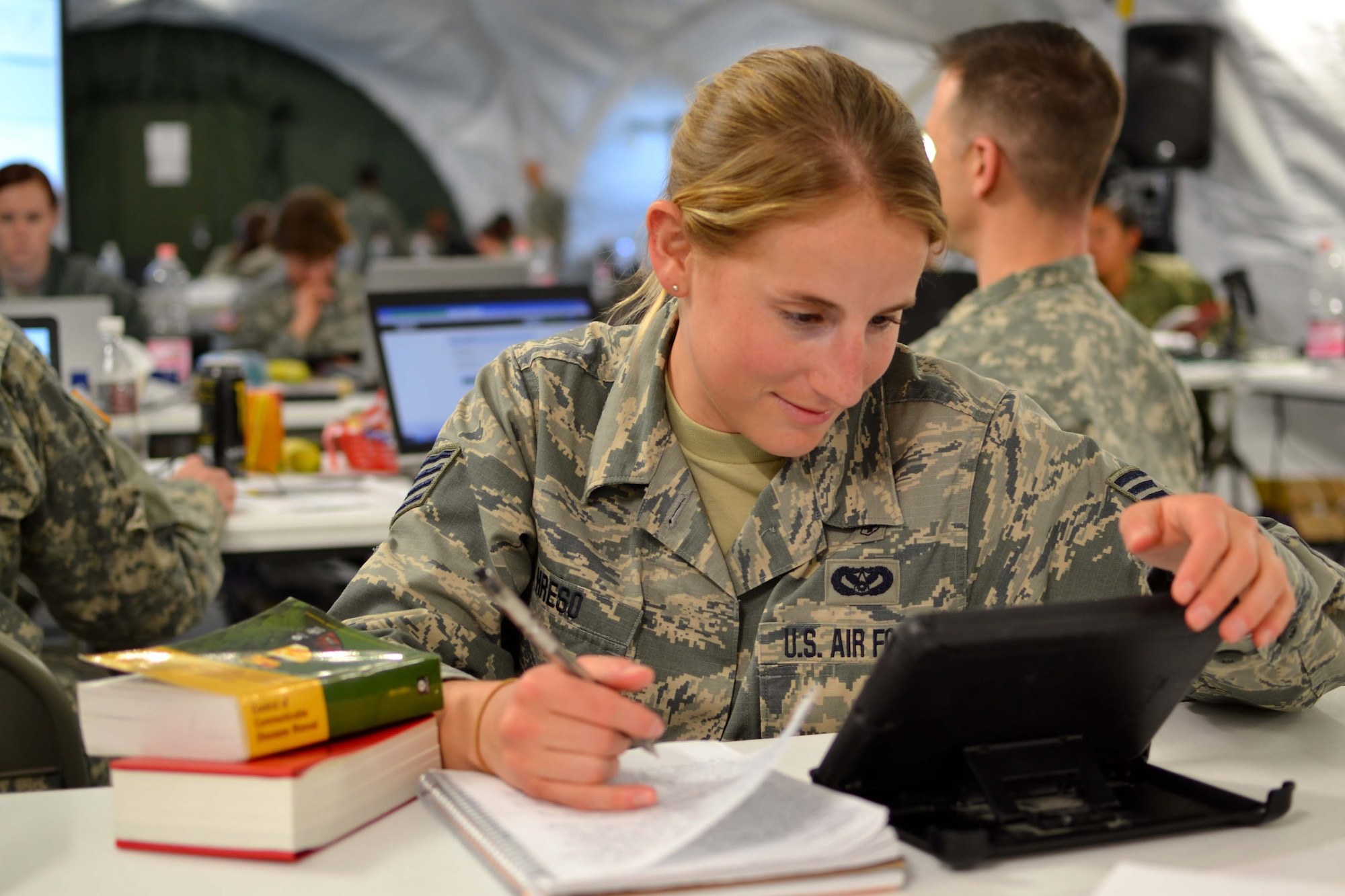 Staff Sgt. Cristina Hreso, a 111th Medical Group public health technician from Horsham Air Guard Station, Pennsylvania, reads up on public health guidance during exercise Anakonda Response 2016 held at Papa Air Base, Hungary, April 27, 2016. The exercise was intended to test and evaluate joint military effectiveness in a multinational humanitarian relief effort while also building real-world bonds with NATO-allied militaries. (U.S. Air National Guard photo by Tech. Sgt. Andria Allmond)
