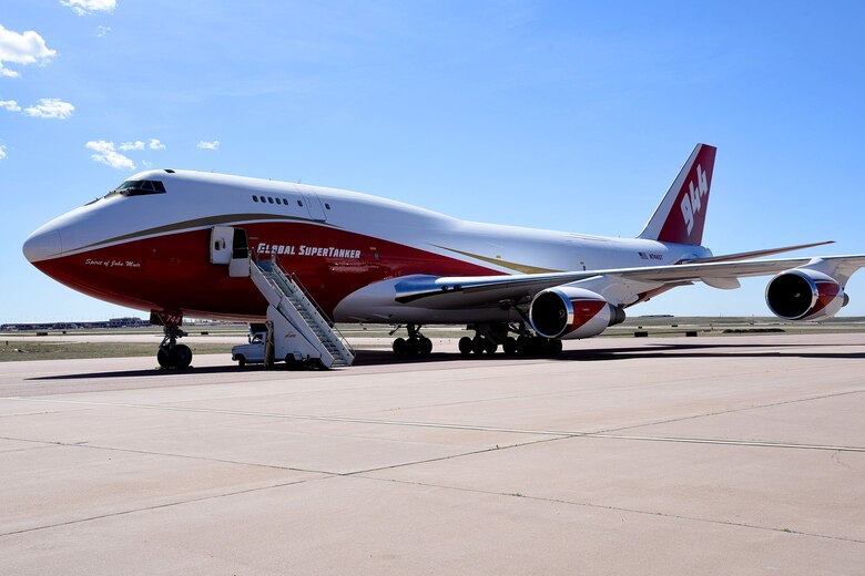 COLORADO SPRINGS, Colo. - The Spirit of John Muir, a firefighting supertanker, was unveiled May 5, 2016 at the old airport in Colorado Springs. The converted B747-400, based in Colorado Springs, can be dispatched at speeds of 600 mph carrying nearly 20,000 gallons of water or fire retardant and can respond to wild fires anywhere in the western U.S. within three hours, according to Global SuperTanker Services. The Peterson Air Force Base Fire Department will provide emergency response services for the aircraft. (U.S. Air Force photo by Robb Lingley)
