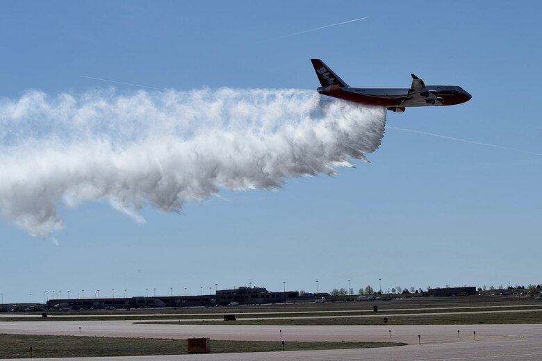 COLORADO SPRINGS, Colo. - The Spirit of John Muir, a firefighting supertanker, was unveiled May 5, 2016 at the old airport in Colorado Springs. The converted B747-400, based in Colorado Springs, can be dispatched at speeds of 600 mph carrying nearly 20,000 gallons of water or fire retardant and can respond to wild fires anywhere in the western U.S. within three hours, according to Global SuperTanker Services. The Peterson Air Force Base Fire Department will provide emergency response services for the aircraft. (U.S. Air Force photo by Robb Lingley)