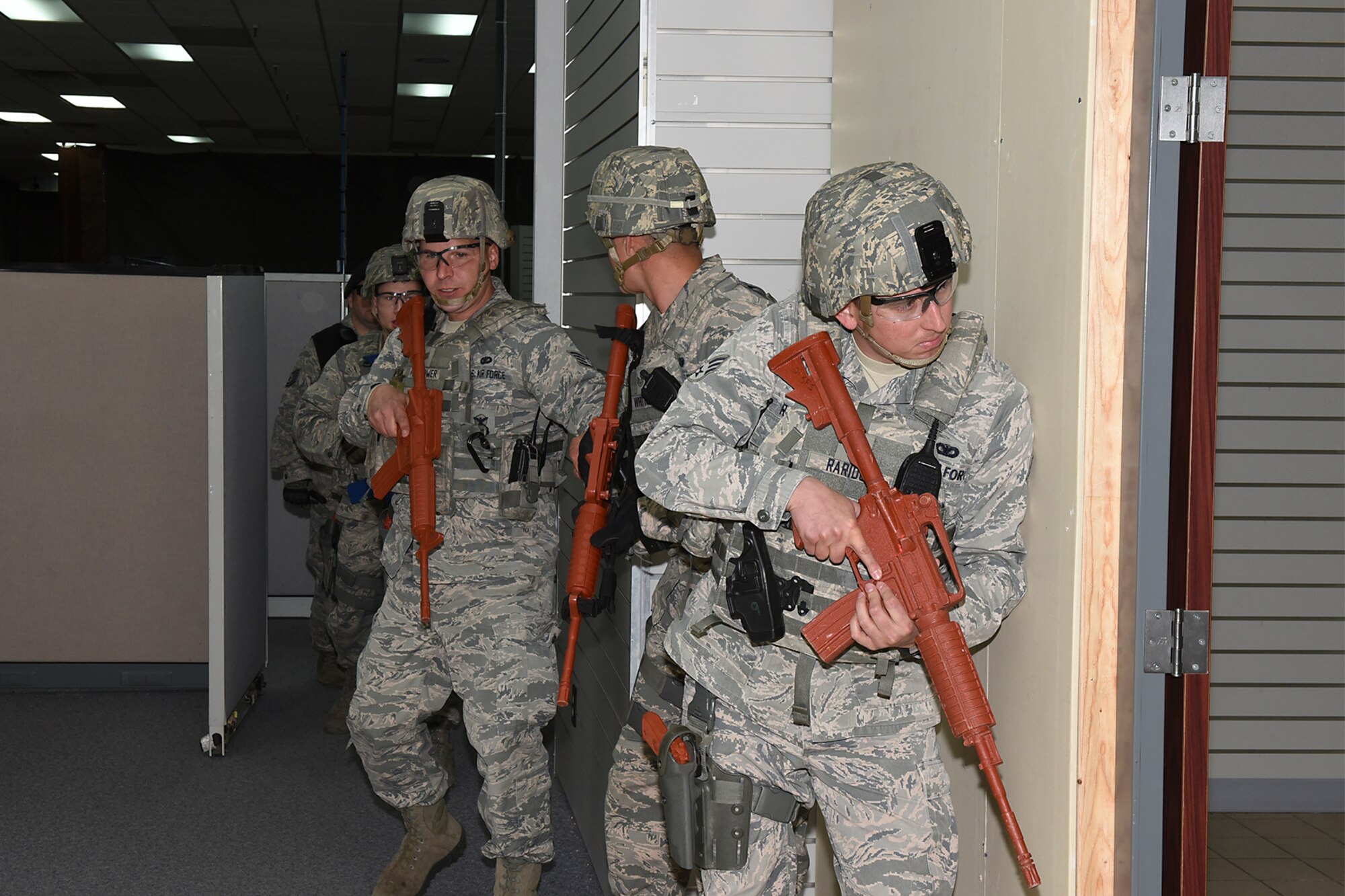 PETERSON AIR FORCE BASE, Colo. – Airmen from the 21st Security Forces Squadron, respond to a simulated shooter/hostage event during Condor Crest at Peterson Air Force Base, Colo., April 26, 2016.  This exercise is designed to evaluate the wing’s readiness for real-world events. (U.S. Air Force photo by Philip Carter)    