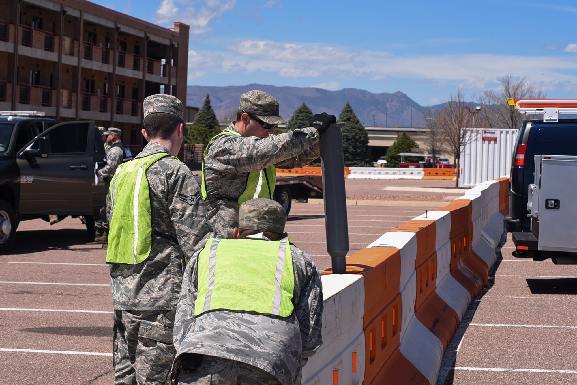 PETERSON AIR FORCE BASE, Colo. – Airmen from the 21st Security Forces Squadron, respond to a simulated shooter/hostage event during Condor Crest at Peterson Air Force Base, Colo., April 26, 2016.  This exercise is designed to evaluate the wing’s readiness for real-world events. (U.S. Air Force photo by Philip Carter)    