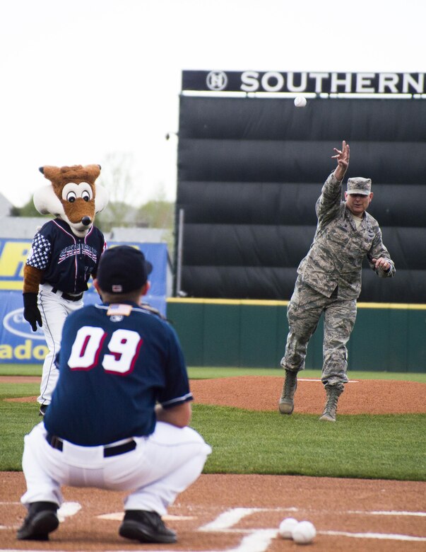 COLORADO SPRINGS, Colo. -Col. Gary Cornn, 721st Mission Support Group commander, at Cheyenne Mountain Air Force Station, Colorado, throws the ceremonial first pitch prior to the game between Colorado Springs Sky Sox and Oklahoma City Dodgers at the Security Service Field in Colorado Springs, Colorado, May 6, 2016. During the event, 1st Lt. Fanita Schmidt, 4th Space Operations Squadron, sang the National Anthem, while the High Frontier Honor Guard presented the colors. (U.S. Air Force photo/Tech. Sgt. Julius Delos Reyes)