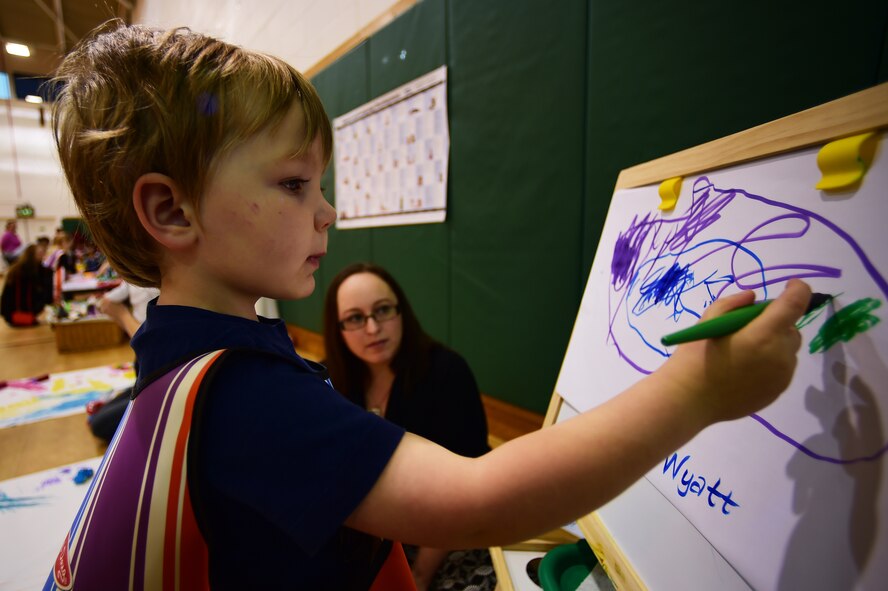 "The kids get to explore paints and different textures, while working on hand-eye coordination," said Maxine Ababa, 423rd Medical Squadron behavioral health administrator. "It's great. They get to learn through play."

See how these behavioral health techniques are being applied across the U.S. Air Force at: http://www.airforcemedicine.af.mil/

(U.S. Air Force photo by Tech. Sgt. Jarad A. Denton/Released)