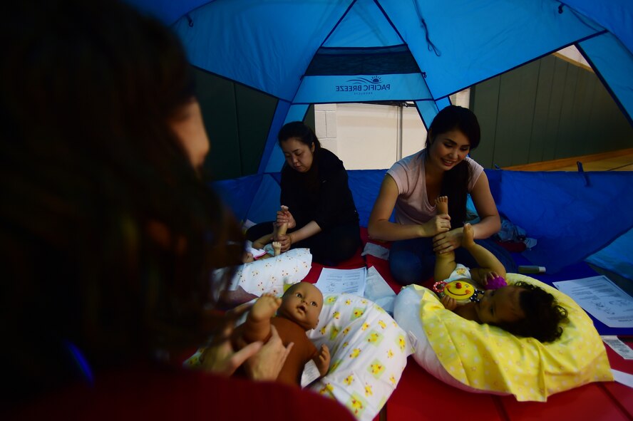 "Infant massage has so many benefits: relaxation, sleep and muscle-tone development, to name a few," said Kristina Da Silva E Silva, 423rd Medical Squadron occupational therapist. "But, the most important benefit is the bonding and social interaction with the child."

To learn more about Infant Massage, click here: http://mayocl.in/27d1mKv

(U.S. Air Force photo by Tech. Sgt. Jarad A. Denton/Released)