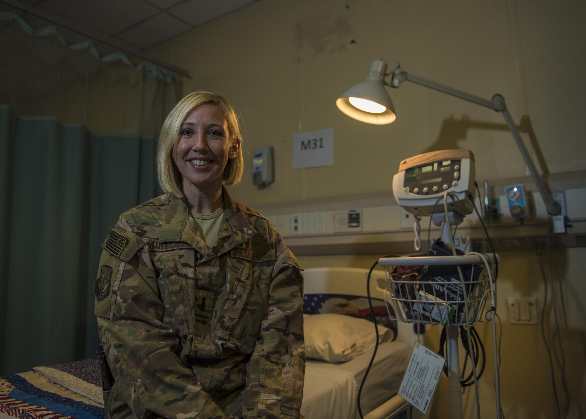 1st Lt. Susannah Winslet, 455th Expeditionary Medical Operations Squadron intermediate care ward nurse, poses for a photo in the intermediate care ward at the Craig Joint-Theater Hospital, Bagram Airfield, Afghanistan, May 10, 2016. Winslet joins the Bagram community from San Antonio Military Medical Center at Fort Sam Houston, Texas. (U.S. Air Force photo by Senior Airman Justyn M. Freeman)
