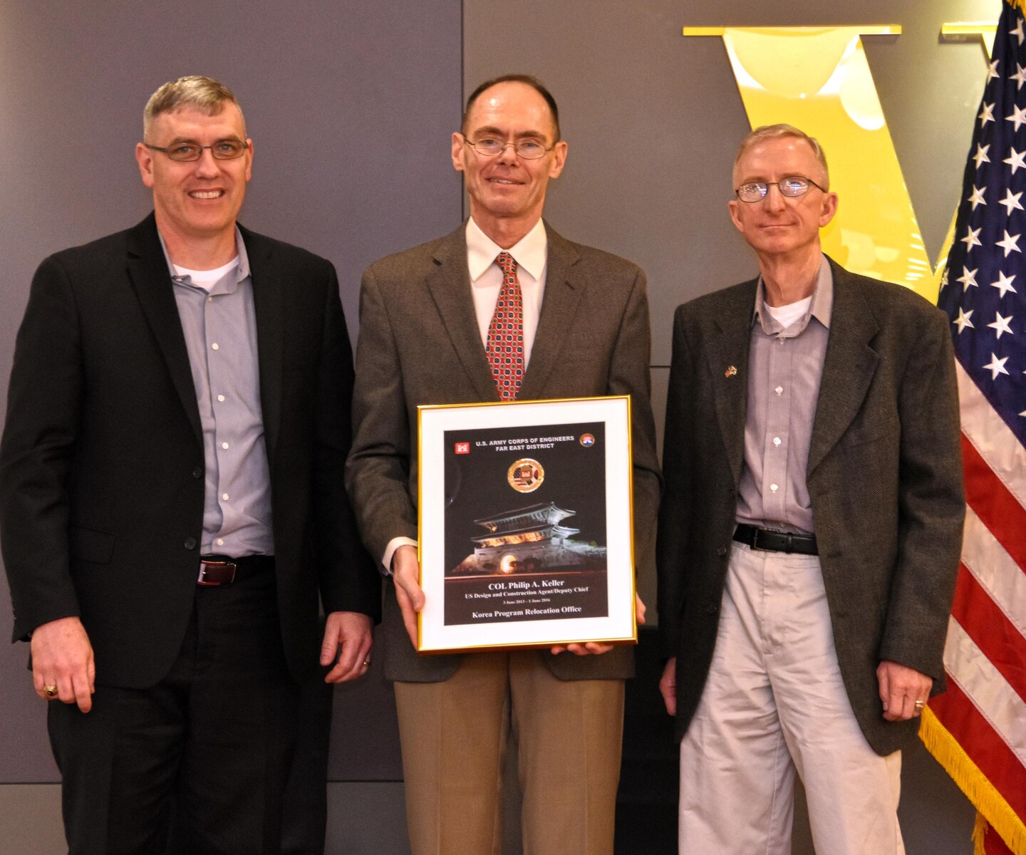 Col. Philip A. Keller (center) poses with Col. Stephen Bales (left), commander of the Far East District, and Maj. Gen. James T. Walton, director of USFK Transformation and Restationing.The event was to commemorate Col. Keller's retirement, as well as that of his fellow officers, Col. Michael D. Nyenhuis and Lt. Col. Mitchell A. DeMarais. The three retiring officers were honored for more than 90 years' combined military service at a dinner on Friday, April 22, 2016, hosted by Maj. Gen. Walton, the senior reservist on the peninsula.